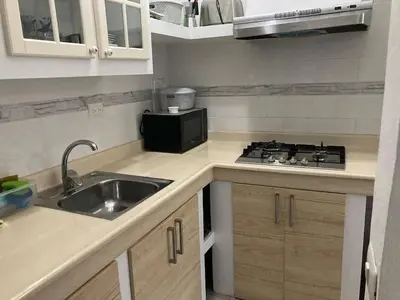 a kitchen with a sink and a stove at Eden 07 08 in La Laguna