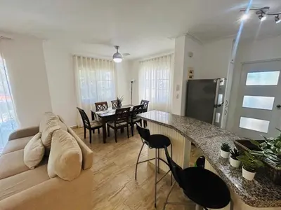 a living room with a couch and a table at Beautiful Place in los Corales bavaro in Punta Cana