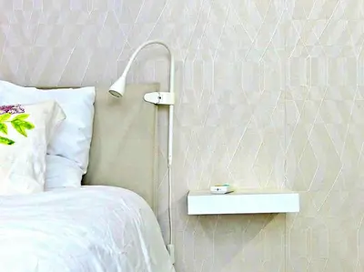 a bedroom with a bed with a nightstand next to a bed sidx sidx sidx at Villa Olga Studio in Rincón Largo