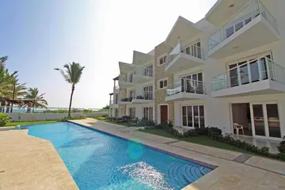 a house with a swimming pool in front of it at Direct View and Access to Beach! in Eslabón