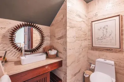 a bathroom with a sink and a mirror at Apartment nearby the beach at Portillo RAA in Las Terrenas