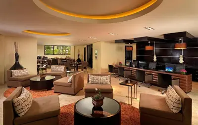 a large living room with couches and a table at The Reserve at Paradisus Punta Cana - All Inclusive in Punta Cana