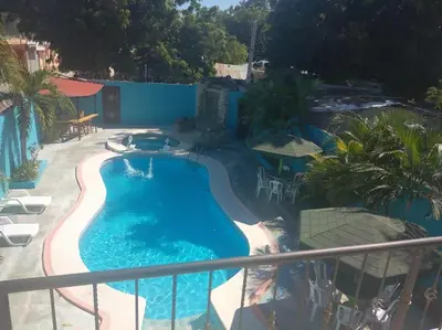 an overhead view of a swimming pool on a balcony at Casa Rural con Piscina in Azua de Compostela