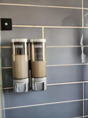 a group of three coffee cups on a wall at Rooftop Apartment in Villa Francisca