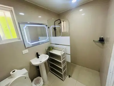 a small bathroom with a sink and a toilet at The Perfect Place for Holiday in los Corales RD in Punta Cana