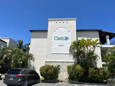 a car parked in front of a building at Apartamento en Punta Cana, White sands in Punta Cana