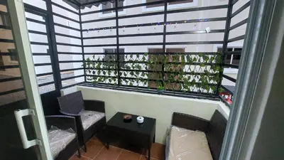 a view of a room with a window with plants at Apartamento Residencial sembrador 3 ciudad Juan Bosch in La Javilla