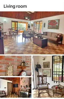 a living room with a couch and a table at Vintage Cabin GB in Constanza