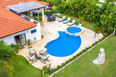 an overhead view of a swimming pool in the backyard of a house at Villa Cajuiles 13, Casa de Campo in La Romana