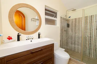 a bathroom with a sink and a shower at Charming 1 Bedroom in Tamarindo Dominicus With Pool in La Laguna