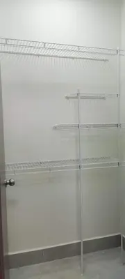 a empty shelf in a room with a white wall at Boca del Mar III, Boca Chica in Boca Chica