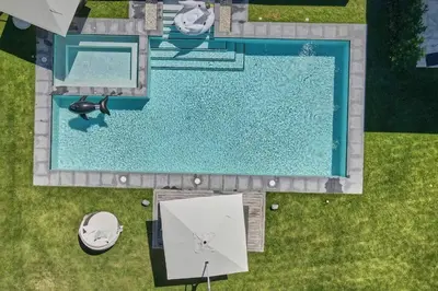 an overhead view of a swimming pool in a yard at Villa Pradera, Upscale Comfort In Casa De Campo in La Romana