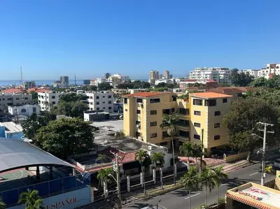 a view of a city with buildings and a street at Central Oasis Work or Explore the city in Santo Domingo