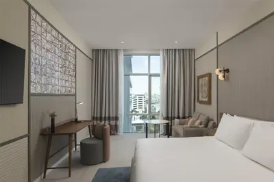 a hotel room with a bed and a desk at Hyatt Centric Santo Domingo in Santo Domingo