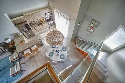 an overhead view of a living room with a table at New loft duplex with rooftop deck in La Laguna