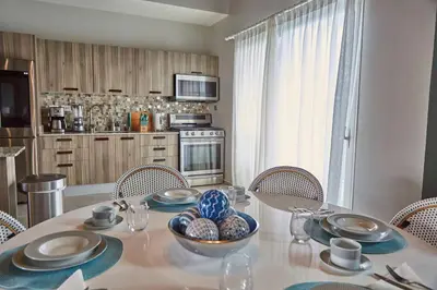 a kitchen with a table with a bowl of eggs on it at New loft duplex with rooftop deck in La Laguna