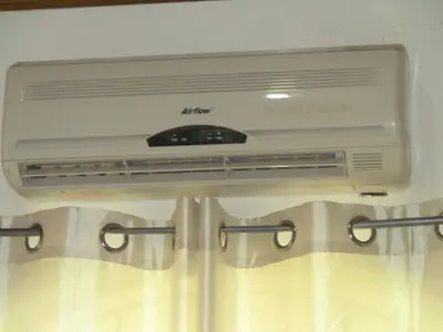 a air conditioner hanging from the ceiling in a room at Castillo Romano in Las Terrenas