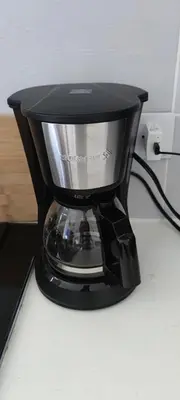 a black coffee maker sitting on top of a counter at Caribe Home Dominicus Oleandra 3 in La Laguna