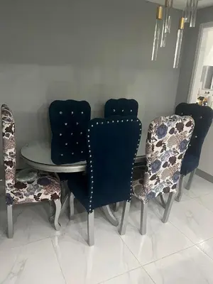 a table and chairs in a room with a table at Sol tropical in La Grúa
