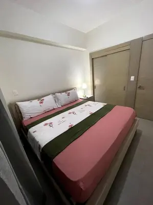 a bedroom with a large bed in a room at Luxury Santo Domingo Tower Condo in Santo Domingo