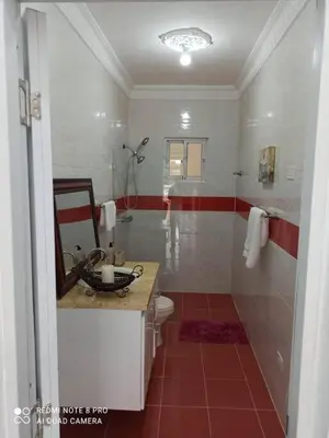 a bathroom with a shower and a toilet and a sink at Modern Country Side Lux Apt in La Ceibita