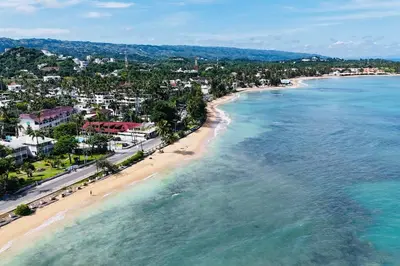 an aerial view of a beach in the ocean at Aligio Beachfront Resort & Spa in Las Terrenas