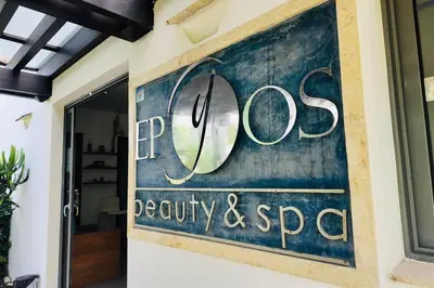 a sign for a spa on the side of a building at Aligio Beachfront Resort & Spa in Las Terrenas