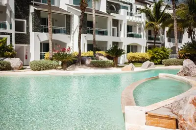 a swimming pool in front of a building at 104 PL - Elegante y moderno, posición perfecta in La Laguna