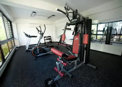 a gym with two exercise bikes in a room at Divine Stay 3 Bedroom One minute from the beach on the malecon in San Felipe de Puerto Plata