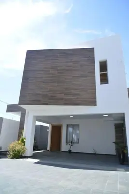 a large white house with a large entrance at Gac 12 casa #1 in Los Paredones