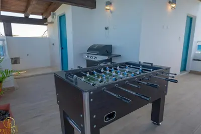 a room with a foosball table with many controls at Brisas del norte in Sosúa
