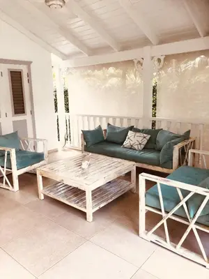 a living room with a couch and a coffee table at Tropical Villa 4Bedroom 3Baths and Pool Near Beach in Las Terrenas