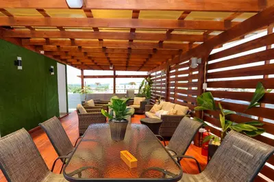 a dining room with a table and chairs at Edificio Amber 1 in San Cristóbal