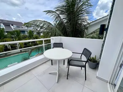 a white table and two chairs on a balcony at AD-301 Ático Duplex Estrella Dominicus in La Laguna