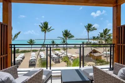 a room with a view of the beach and ocean at Secrets Playa Esmeralda Resort & Spa - All Inclusive in Miches