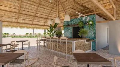a restaurant with wooden ceilings and tables and chairs at Dreams Playa Esmeralda Resort & Spa - All Inclusive in Miches