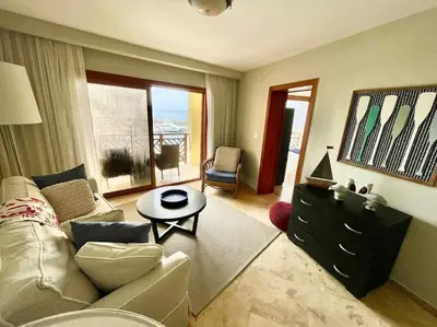 a living room with a couch and a table at Hotel en Samana con vista al Mar in Sabana