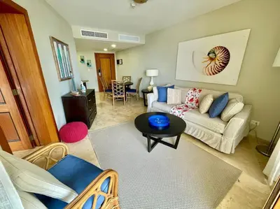a living room with a couch and a table at Hotel en Samana con vista al Mar in Sabana