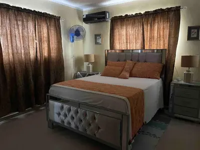 a bedroom with a large bed and a blue balloon at Sábana de la mar in La Tentación