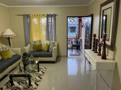 a living room with two couches and a table at Sábana de la mar in La Tentación