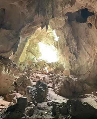 a cave with a light at the end of it at Sábana de la mar in La Tentación