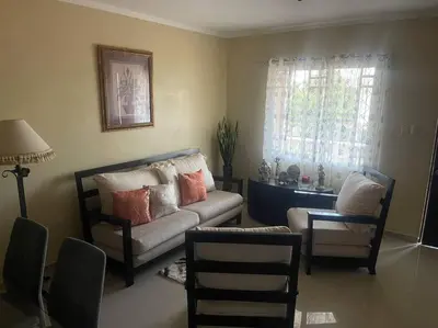 a living room with a couch and a chair at Sábana de la mar in La Tentación