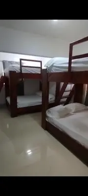 two bunk beds sitting next to each other at Villa Luz in Andrés