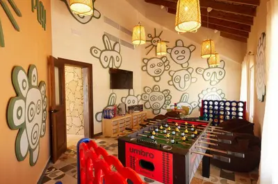 a room with a wall covered in graffiti at Bahia Principe Luxury Esmeralda All Inclusive - Newly Renovated in Punta Cana