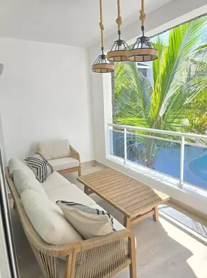 a living room with a couch and a table and a window at Luxury Apartment IZHA 202 in La Laguna