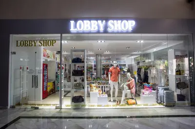 a display window of a clothes shop in a mall at Bahia Principe Grand El Portillo - All Inclusive in Las Terrenas