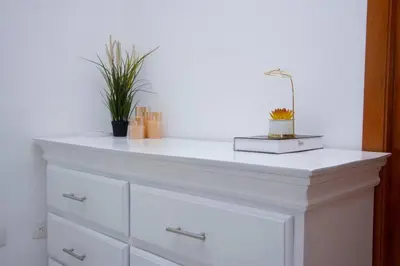 a white counter with plants on top of it at APT 3 HAB Avenida España Piso 1 in La Viva