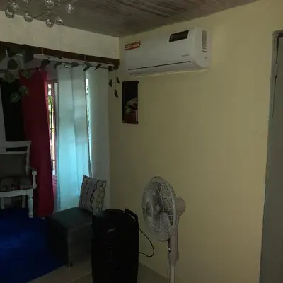 a room with a air conditioner on the wall at Tropical 2 in La Hondonada