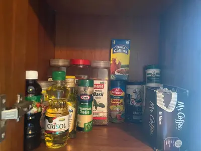 a shelf with a bunch of spices and condiments at Luxury Beach Penthouse with Pool, BBQ, AC, Wi-Fi, 5-Min Walk to El Cortecito & Bavaro Beaches, Punta Cana in Punta Cana