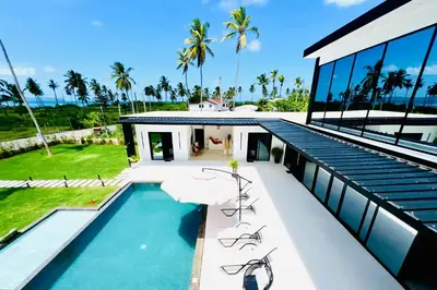 an aerial view of a house with a swimming pool at Casa B&W, Villa luxueuse Exceptionnelle, 8 personnes, à 1 min de la plage in Las Galeras